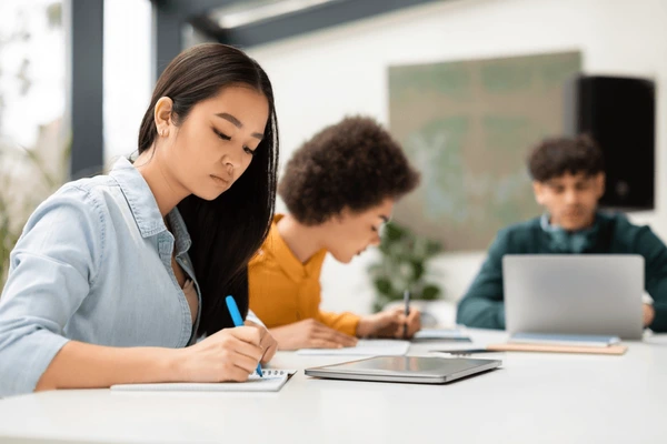 asian-lady-sitting-desk-taking-600nw-2330795283